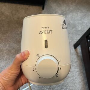 Avent milk or formula bottle warmer. Barely used! User manual included.